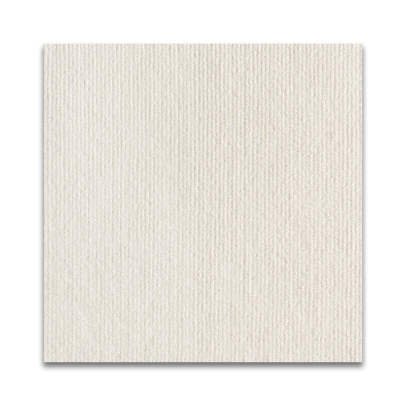 Textured beige square tile on a white background