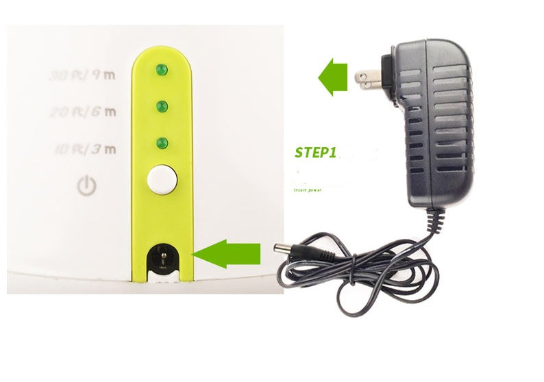 
"Automatic dog ball launcher power connection step showing how to plug the adapter into the device."