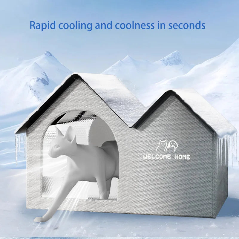 A-frame pet house with snowy roof design, showing a cat exiting the entrance, illustrating rapid cooling feature