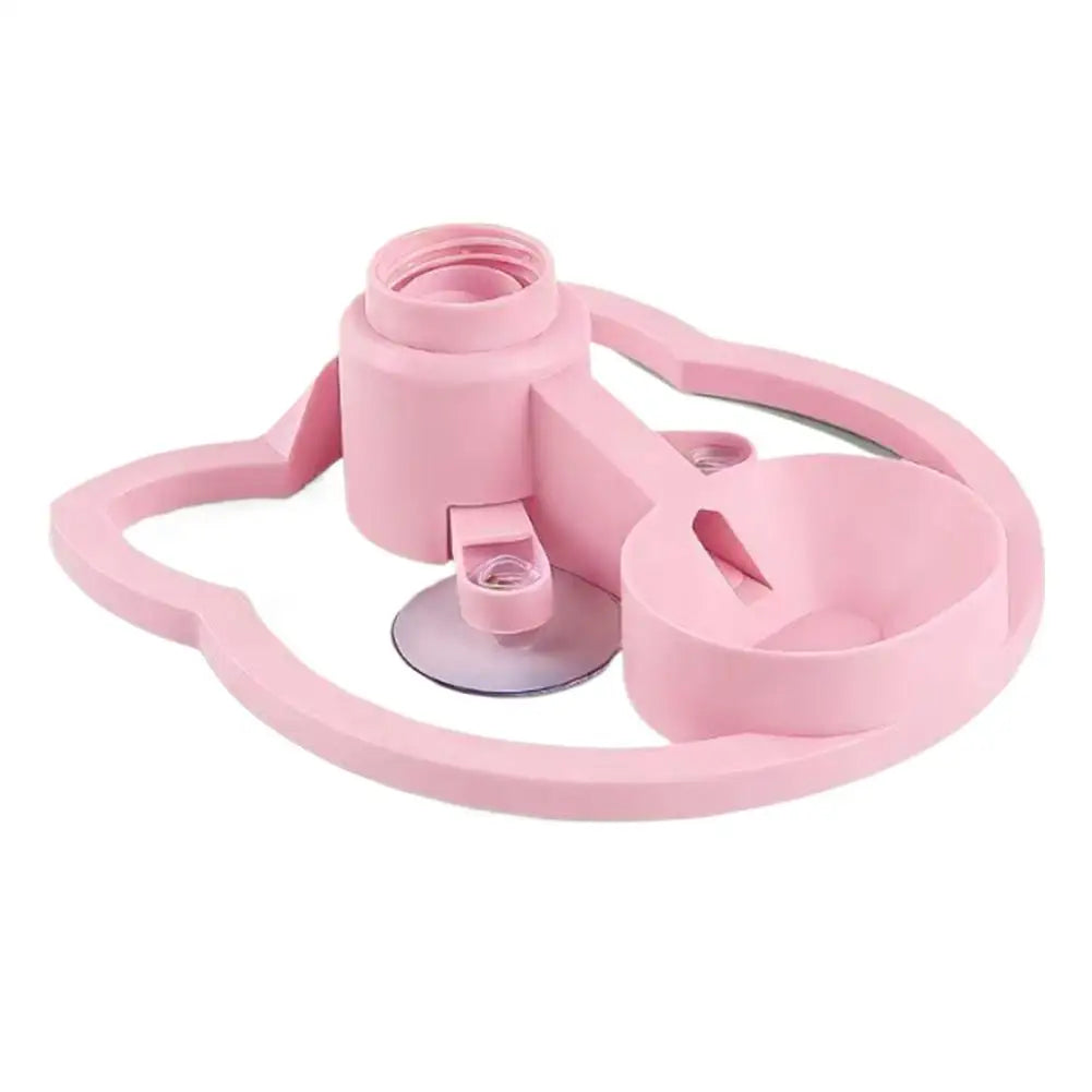Pink suction cup with a handle on a white background