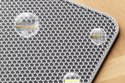 Textured surface with honeycomb pattern on a wooden background