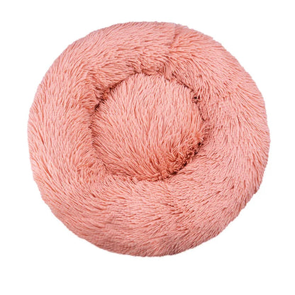 Pink yarn ball on a white background