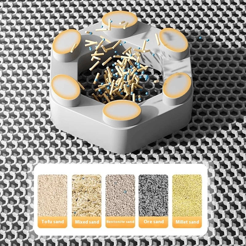 Pet toy with sand and sticks on a textured surface, showing color options below.