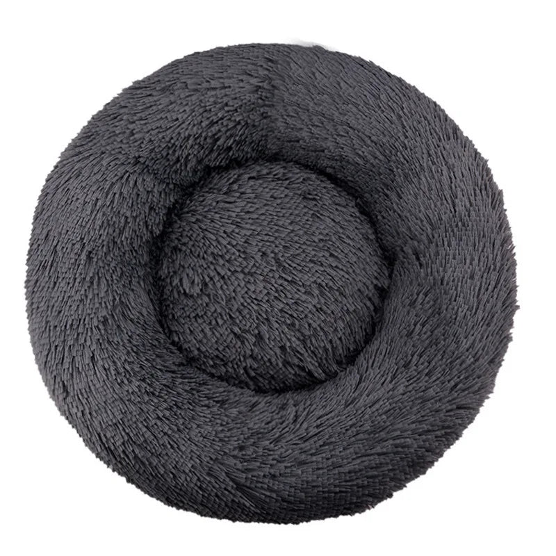 Coiled gray skein of yarn on a white background