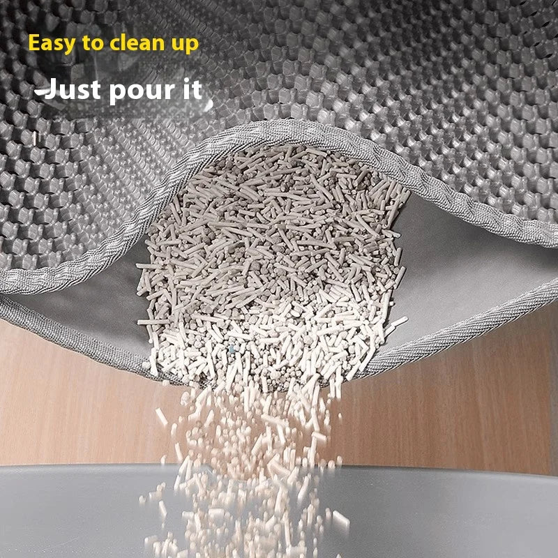 Cat litter being poured into a scoop with text 'Easy to clean up, Just pour it' on a textured surface.